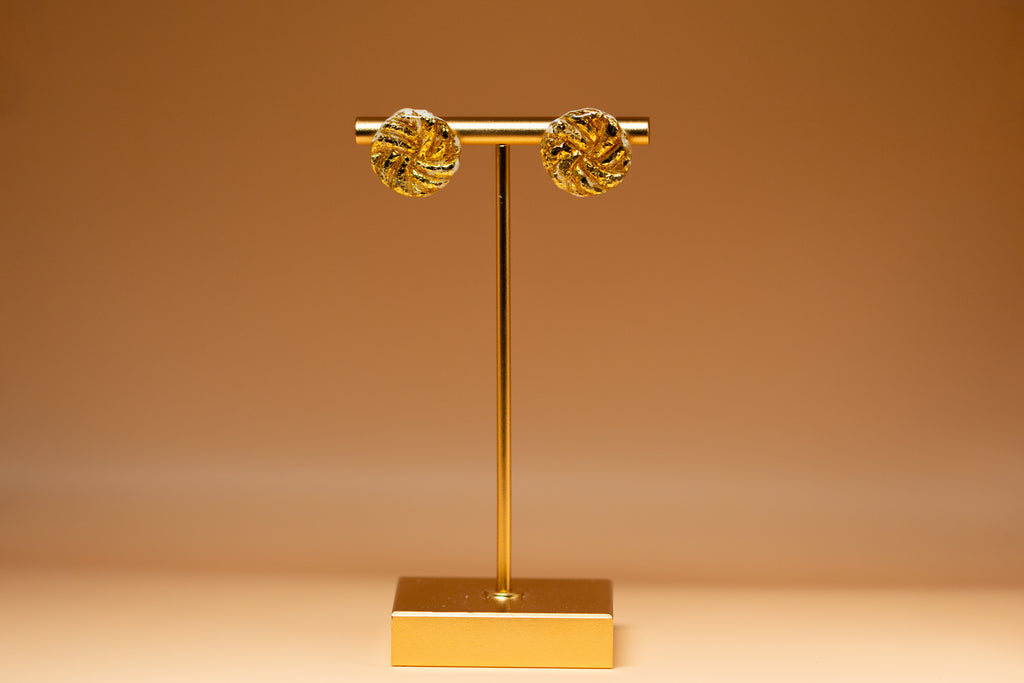The Gilded Studs