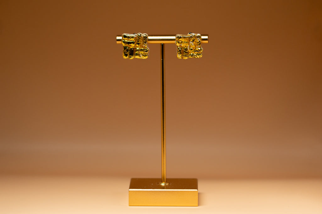 The Gilded Studs