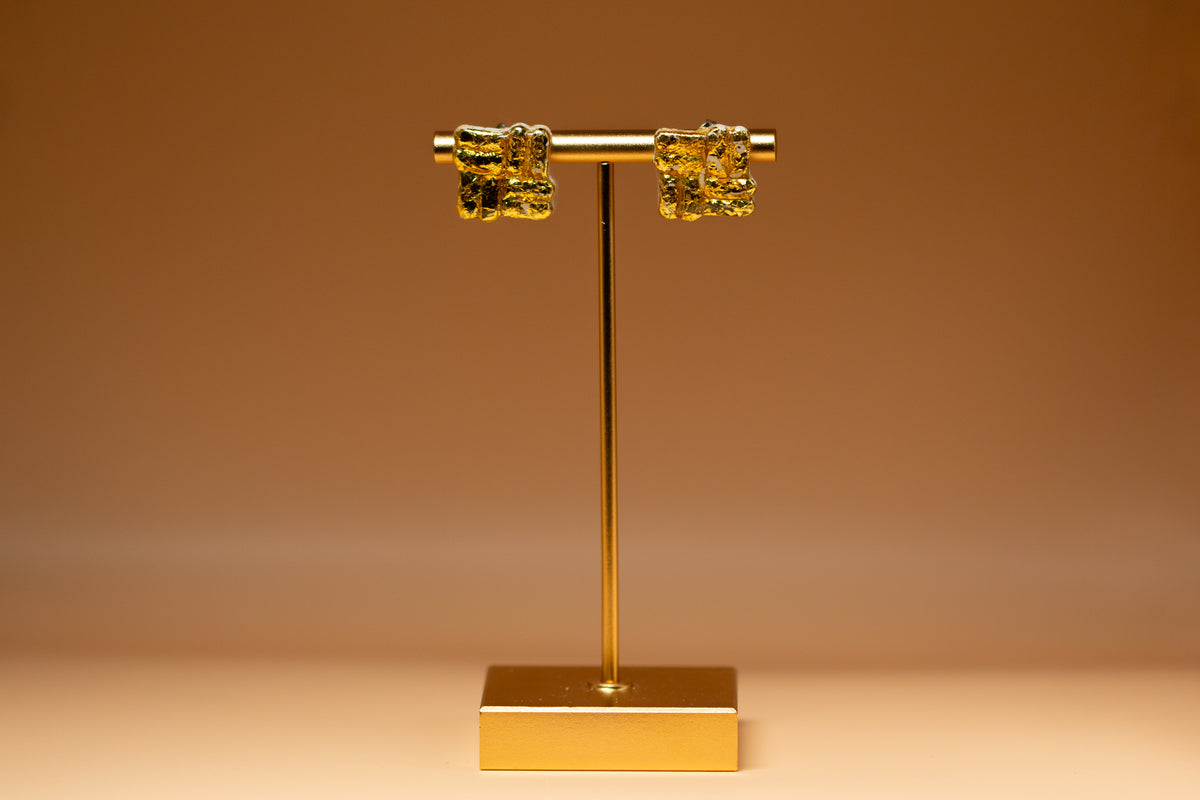 The Gilded Studs