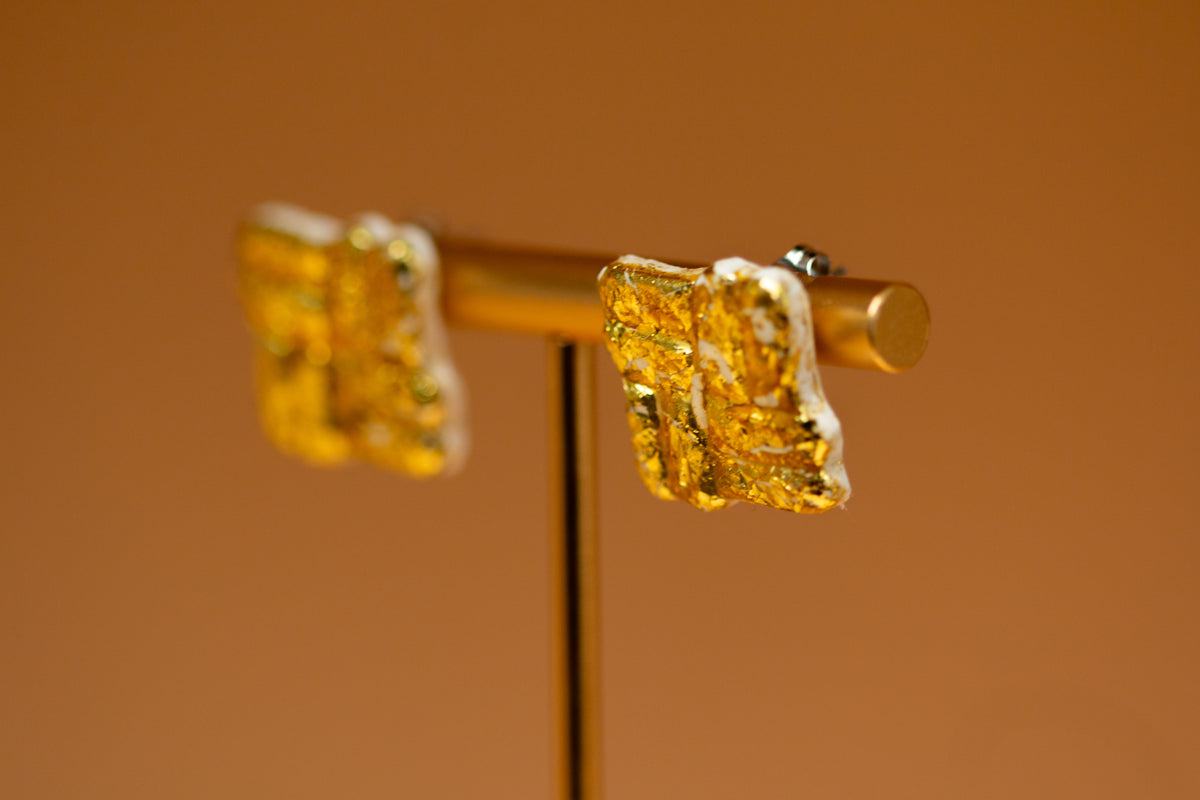 The Gilded Studs